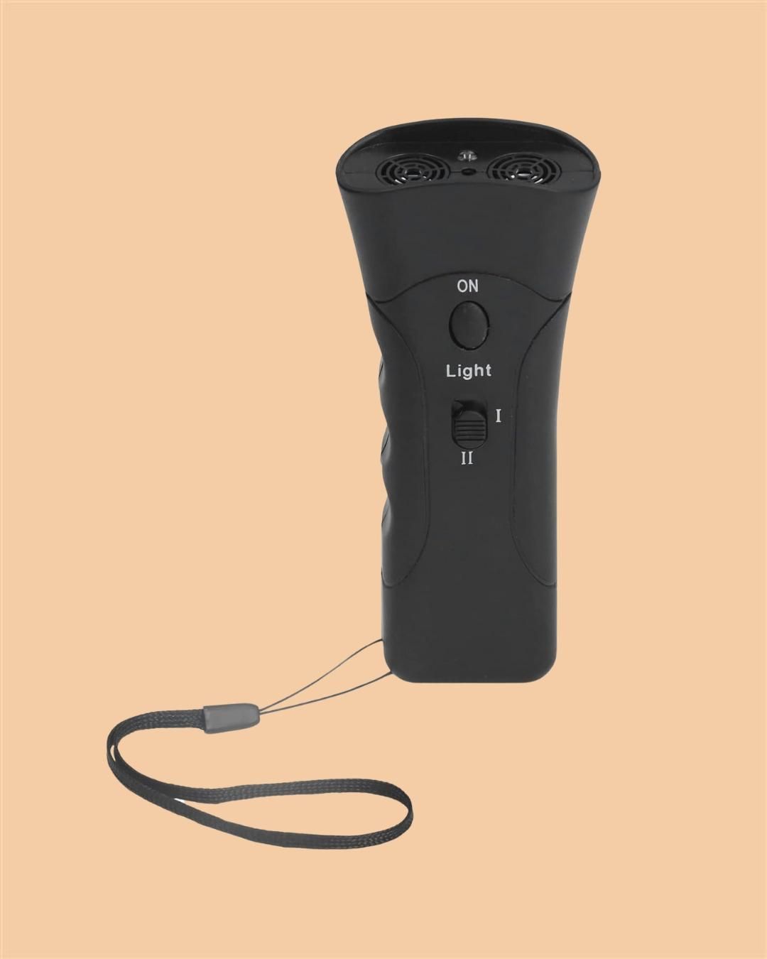 Ultrasonic Dog Chaser handheld device emitting high-pitched sound to stop aggressive dog attacks safely